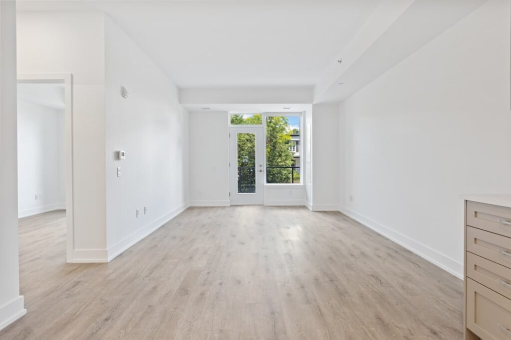 Illustrative interior with white walls and a doorway for room-by-room photo documentation