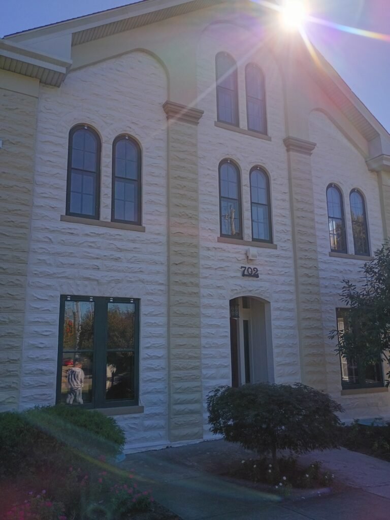 Front entrance of St. Elizabeth Catholic Charities in New Albany, Indiana, during MCM Home Maintenance's exterior painting project